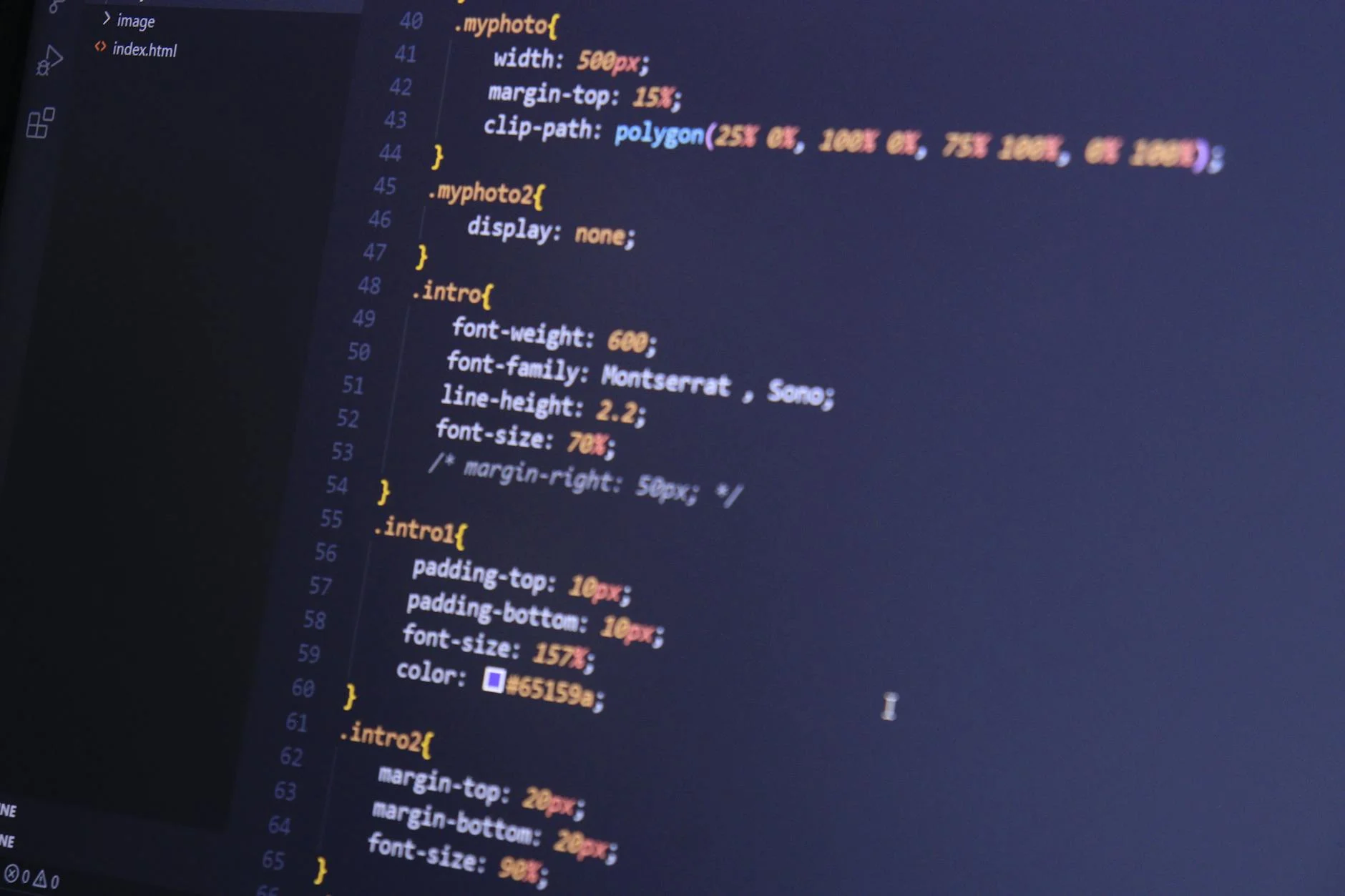 User filling out a form on a laptop screen in a modern interface