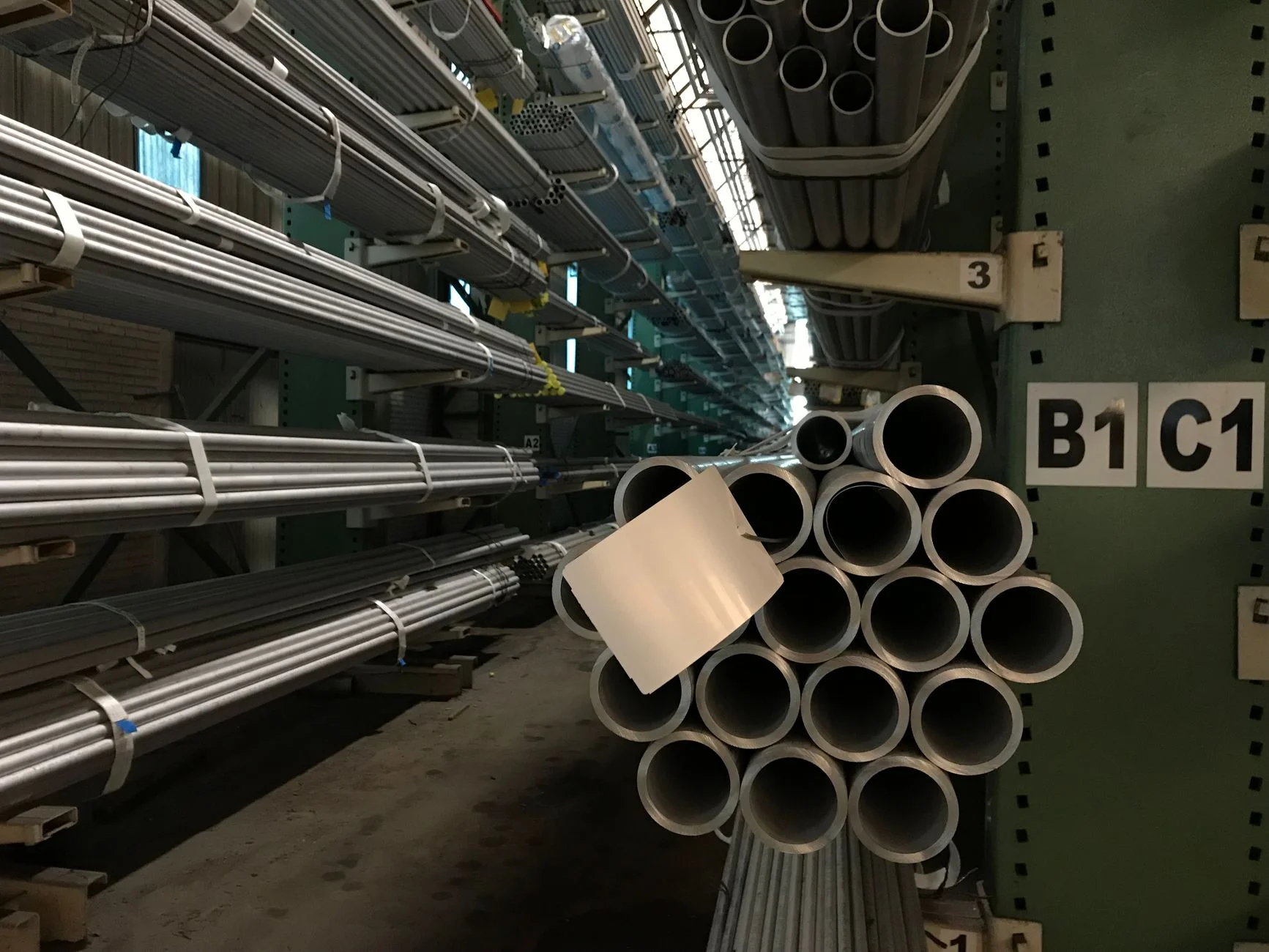 Rows of data center cooling infrastructure representing large-scale data processing