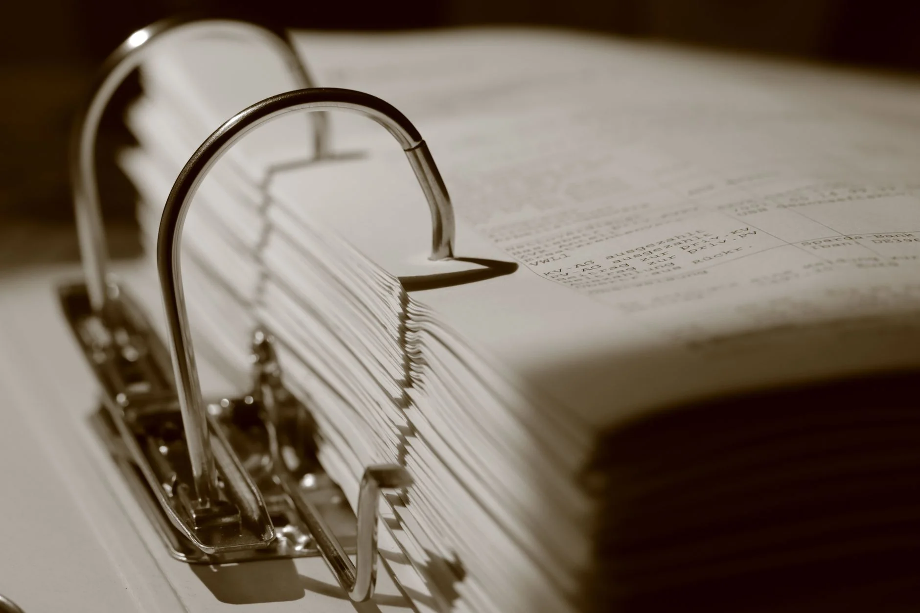 Stack of contract pages representing SaaS vendor agreement review