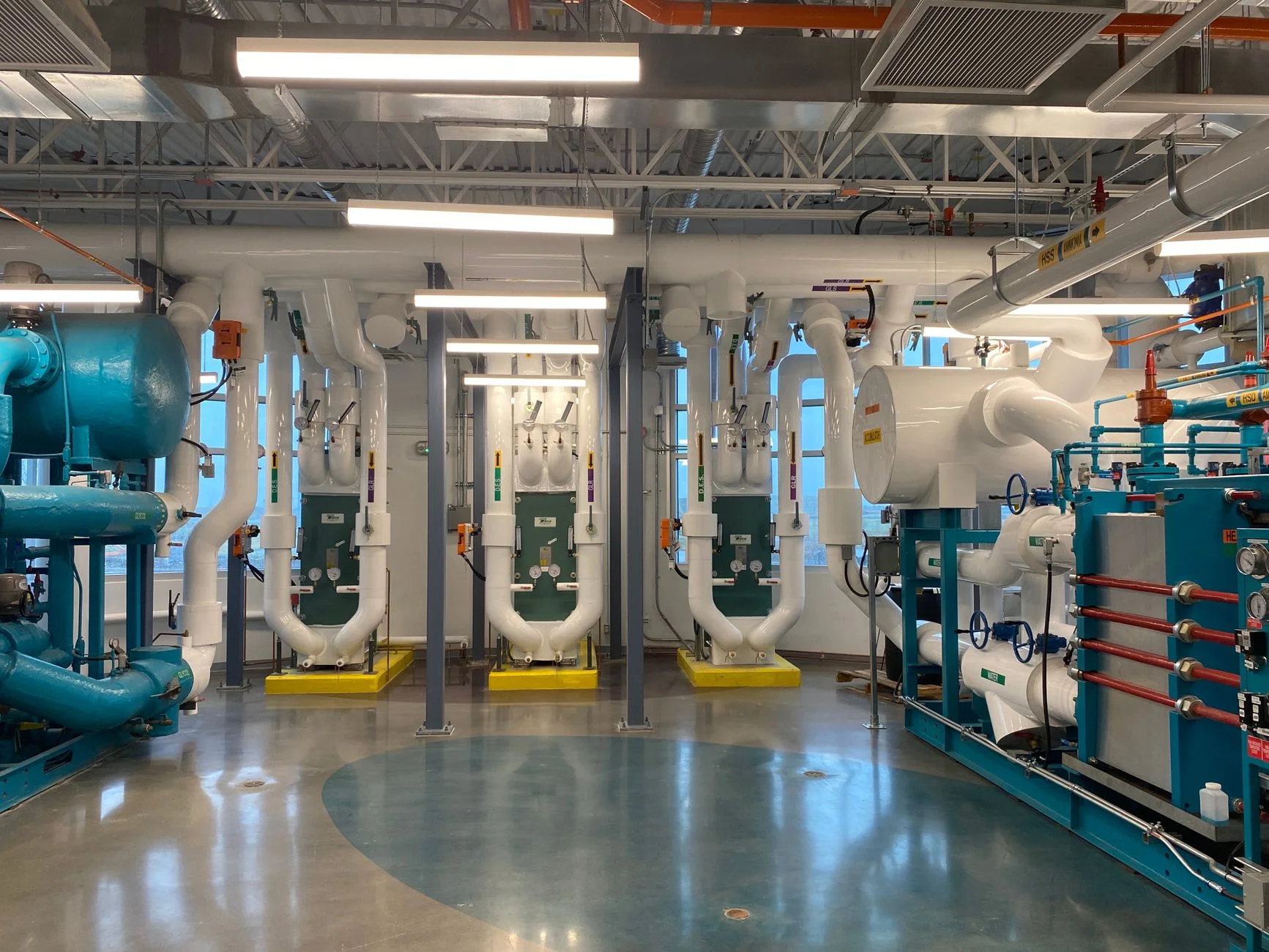 Rows of cooling infrastructure in a data center, representing the quiet machinery behind automated pipelines